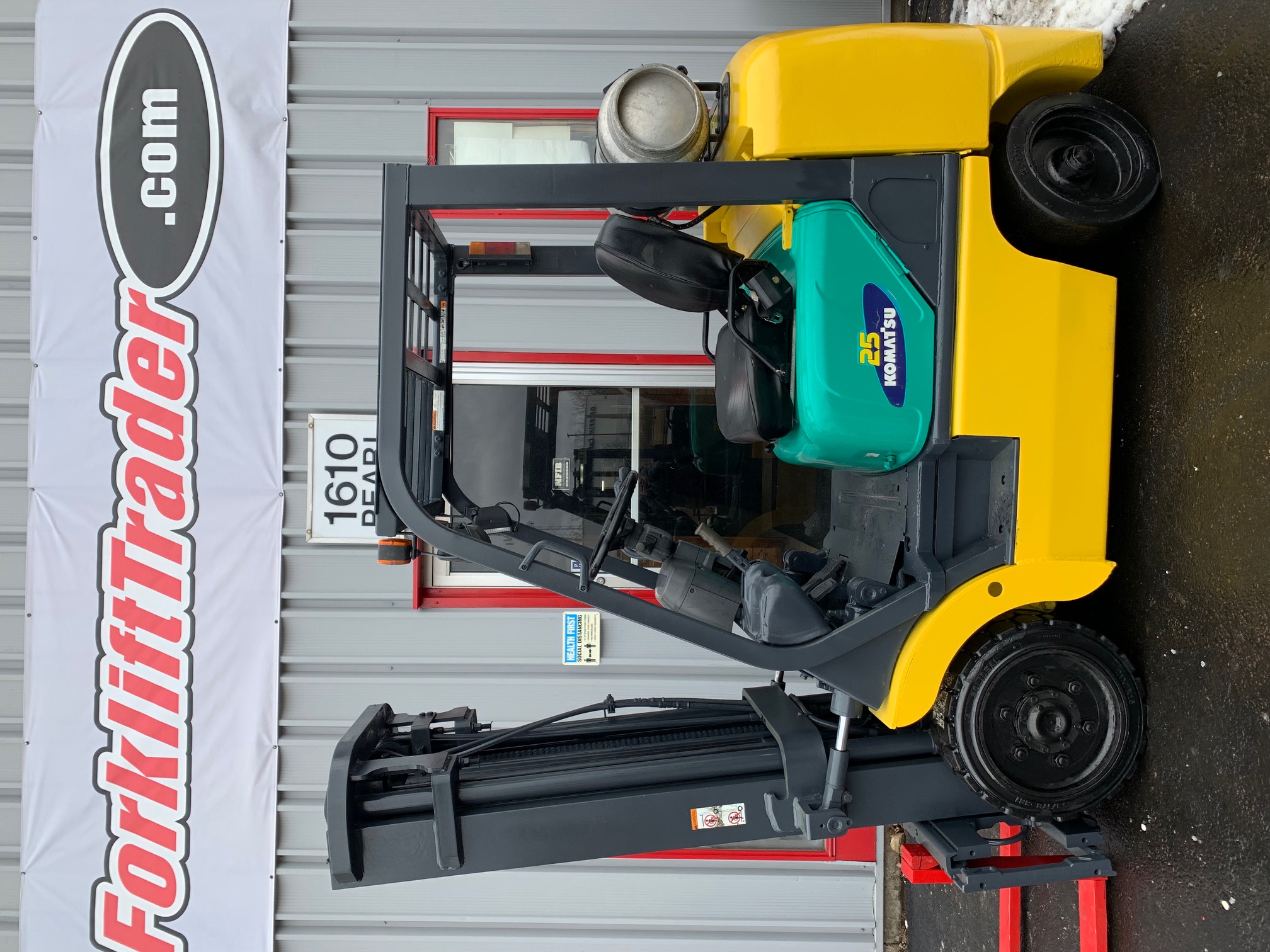 Yellow komatsu forklift with 188" lift height for sale