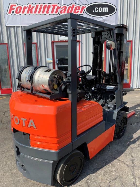 Orange 1988 toyota forklift with 5,000lb capacity for sale