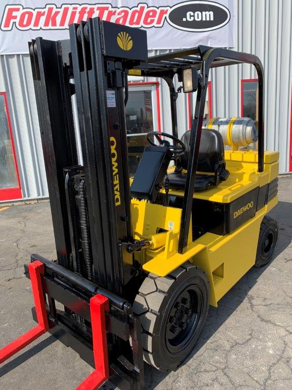 Yellow daewoo forklift with 42" forks for sale