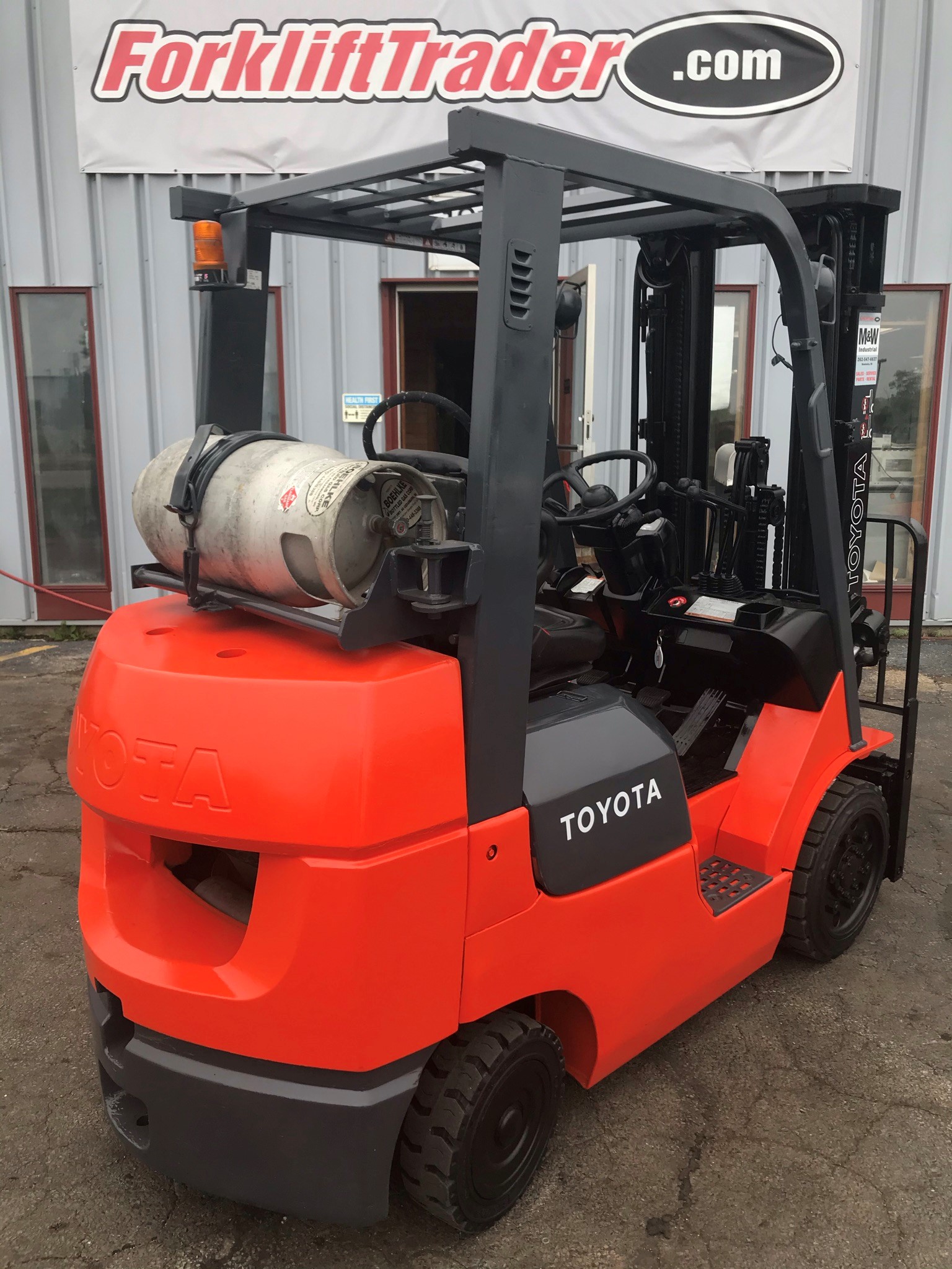 Orange toyota forklift with 5,000lb capacity for sale