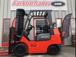 Orange 2004 toyota forklift with 189" lift height for sale