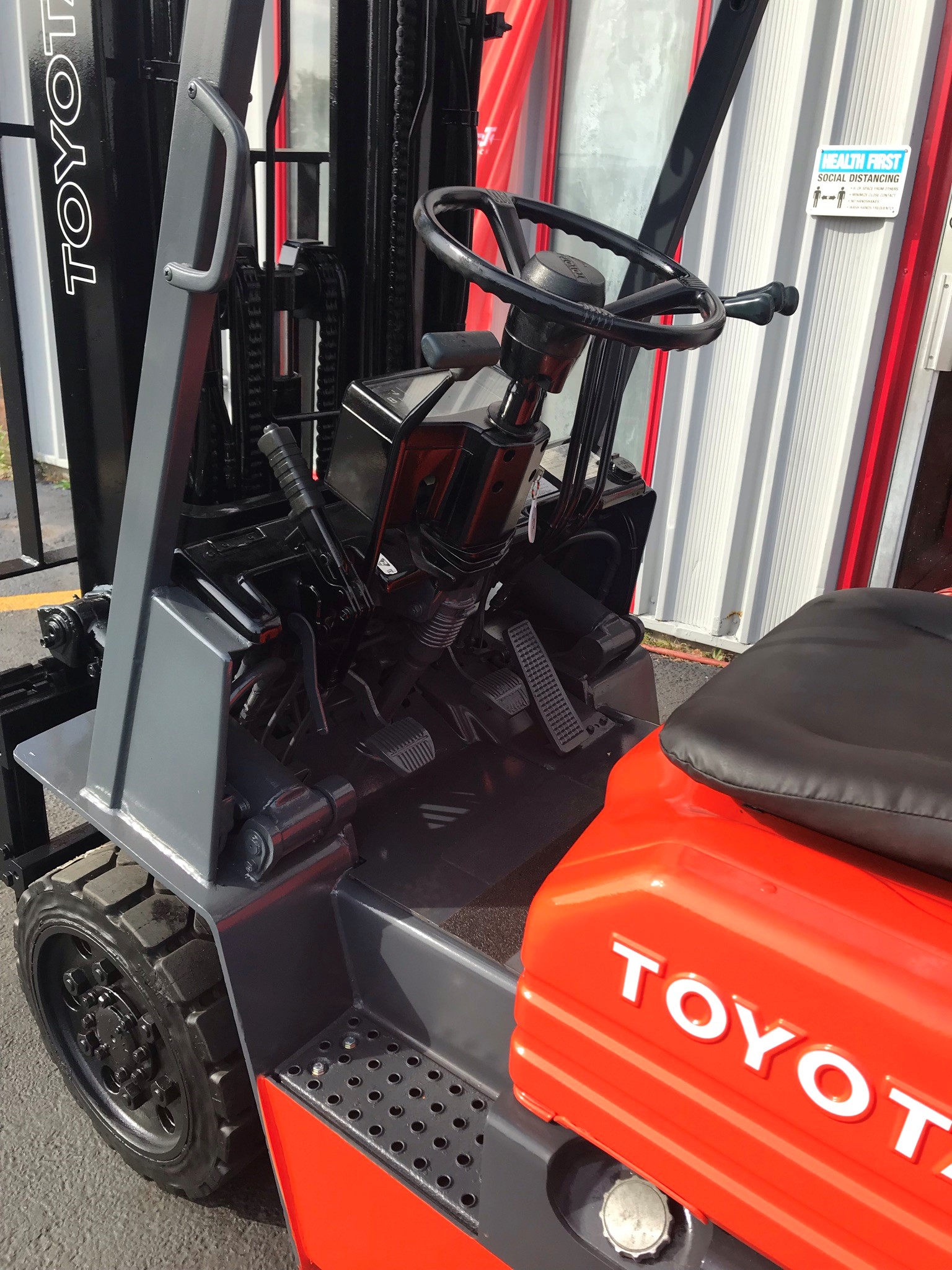 Orange toyota forklift with side shifter for rent