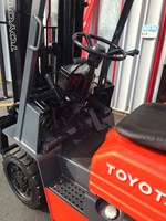 Orange toyota forklift with side shifter for rent