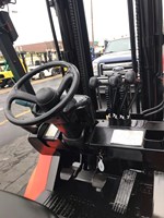 Orange toyota forklift with side shifter for rent